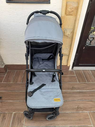 Lightweight compact folding stroller / pushchair