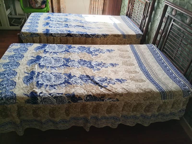 two single iron beds 1