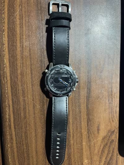 Quamer dual time sports watch.