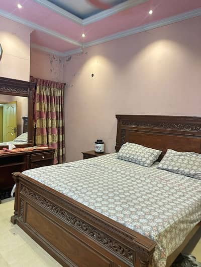 10 Marla 2. Bed Lower Portion Garage Available For Rent Shadman