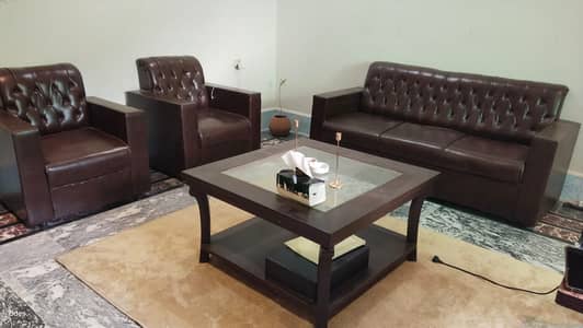 5 seater Sofa set and Table almost new