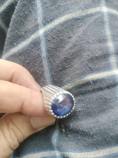 African blue saphire in italian siver ring for sail.