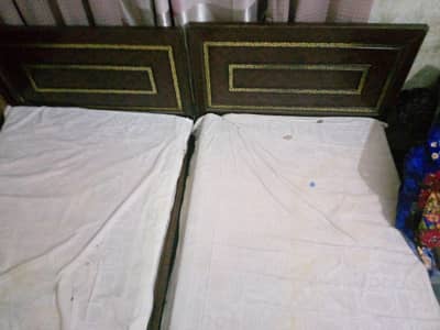 Two single beds with molty foam mattresses