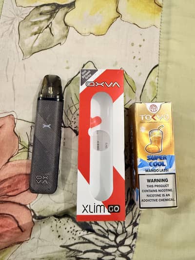 Oxva Xlim Go and tokyo super cool Mango Lassi 50mg full bottle.