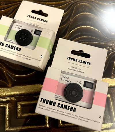 Mini thumb camera
