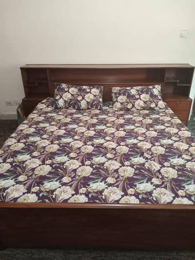 1 wooden and 1 iron bed set with matteres