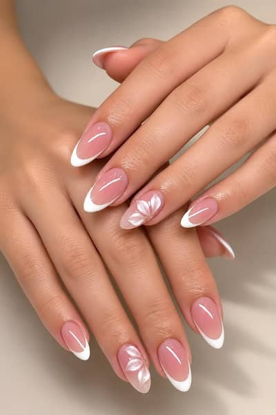 Elegant French Tip Nail Art with 3D Floral Design