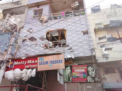 Prime Commercial Property with Basement, Shops & 4 Residential Units