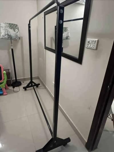 slightly used cloth stand