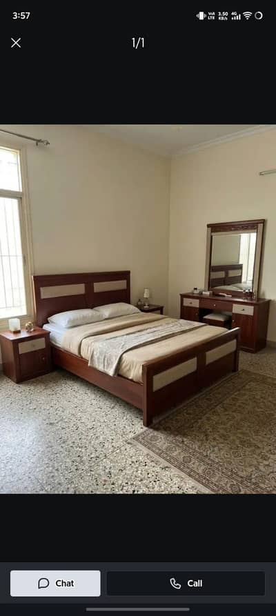 bed with sidetables and dressing