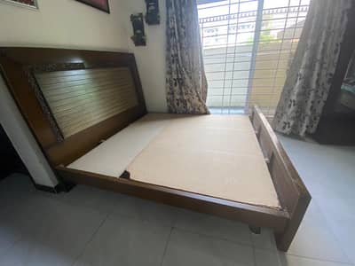 king bed set and 2 tables