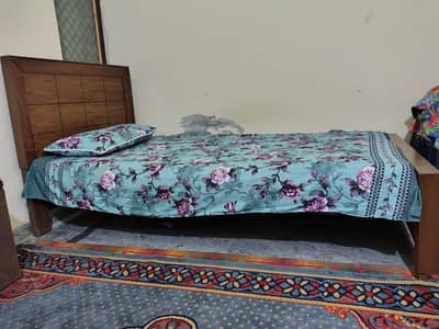 Single wooden bed for sale