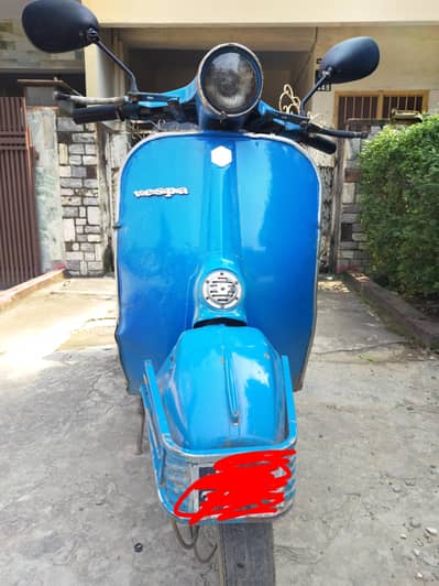 Vespa model 74 round light