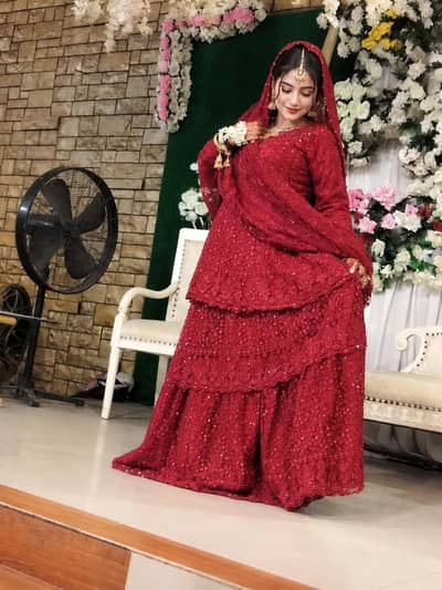 Beautiful Red Bridal Maxi / Lehenga with pouch – Elegant Wedding Wear
