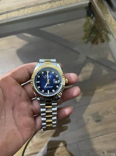 Rolex gold watch