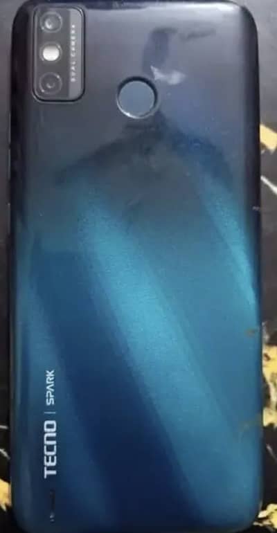 Tecno Spark 6 Go with accessories