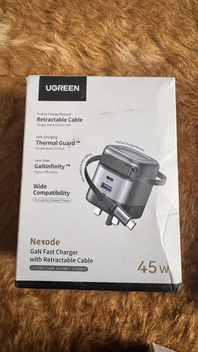 UGREEN Nexode 45W GaN Fast Charger with a retractable USB-C cable.