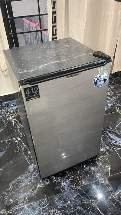 room fridge selling just in 35,000 new condition