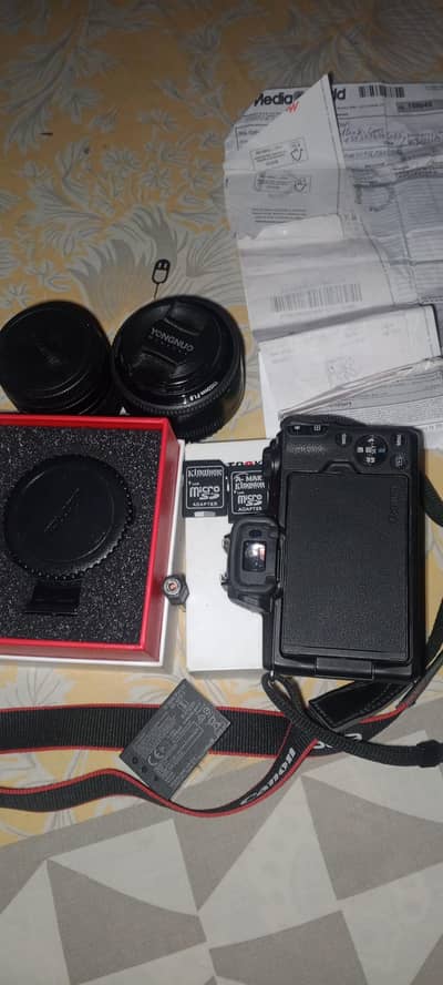 Canon M50 mark 2 with yognuo 50mm and original kit lens