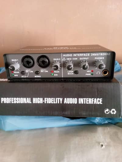 audio interface or microphone with box