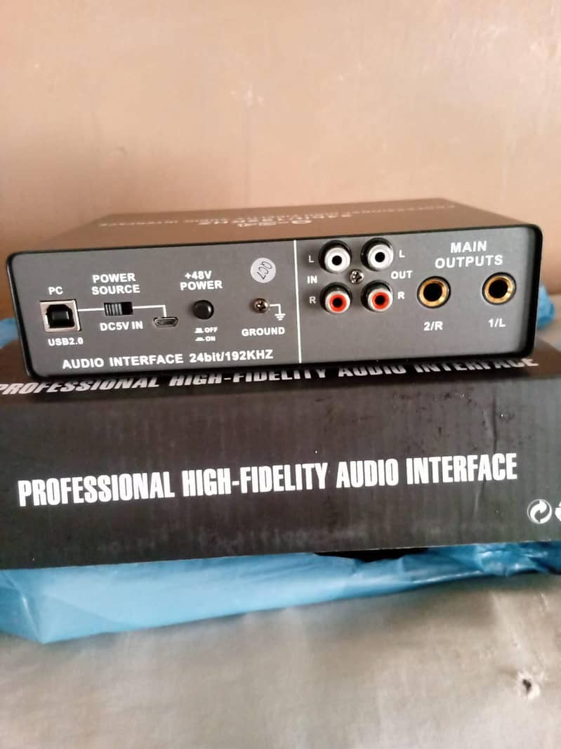 audio interface or microphone with box 2