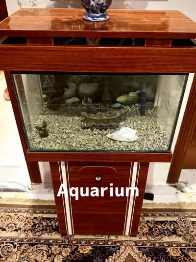 Brand New Aquarium Slight used 10/10 condition. Build-in lights,stones