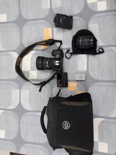 Nikon D5600 DSLR + 18-55mm Kit Lens + Nikkor 50mm f/1.8 Prime