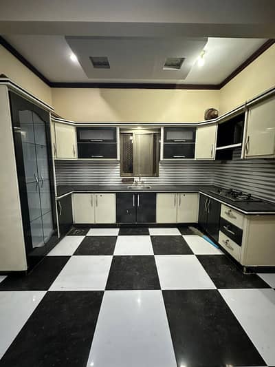 Newly 4 bed drawing lounge portion with roof for sale tiled flooring America kitchen tiled washrooms 24 hours water and electricity separate gate and meters