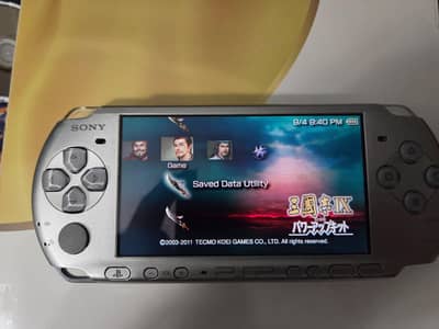 Silver PSP 3000 64GB With Games Installed and Charger