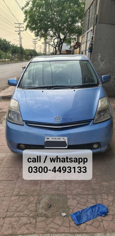 Toyota Prius 1500cc Lahore number full opt wth feature of Auto Parking