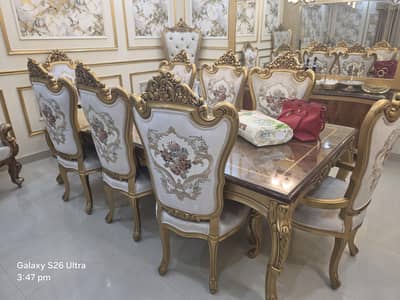 Dinning table with chairs and buffet table and mirror