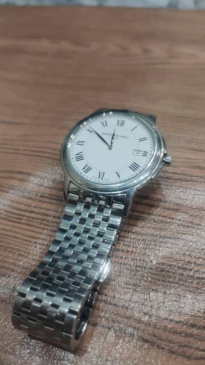 Raymond weil wrist watch that men will see and it's irresistible