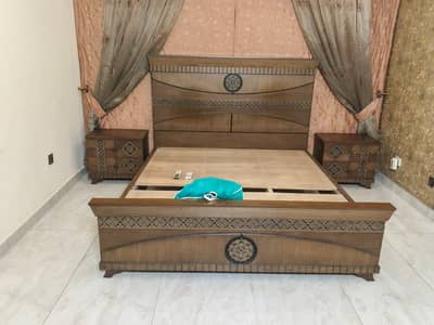 king size bed  sides table . mirror