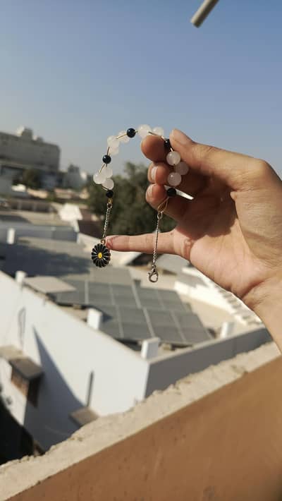 Beautiful adjustable bracelets with charms.