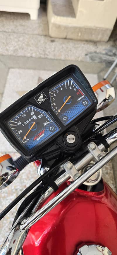 Honda 125 Islamabad number 14k Milage
