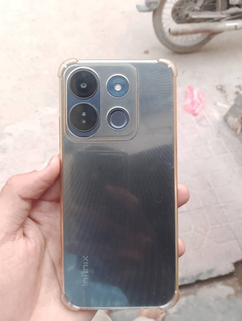 Infinix Smart 7 6