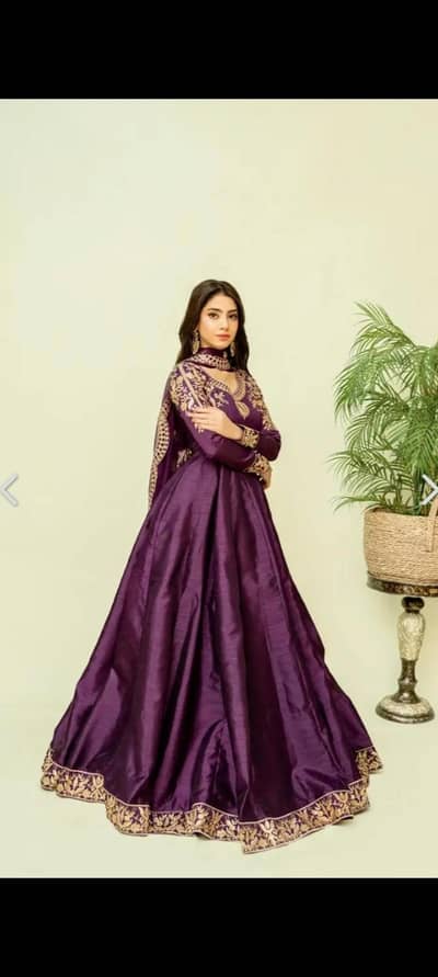 A purple coloured beautiful embroidered maxi