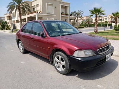 Honda City IVTEC 1999. ptrl AVRGE 16,17per litr. car engine sound less