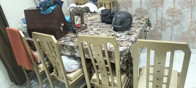 dinning table set with six chairs new condition.