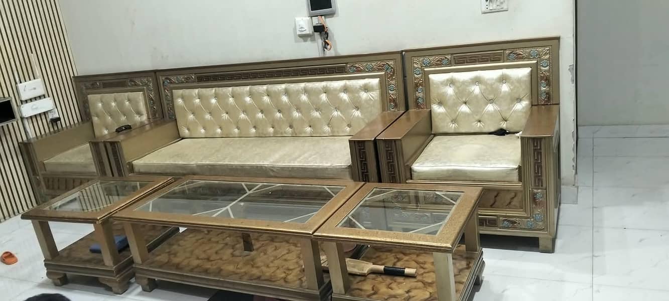Six setter sofa set with 2 small tables and one large table. 1