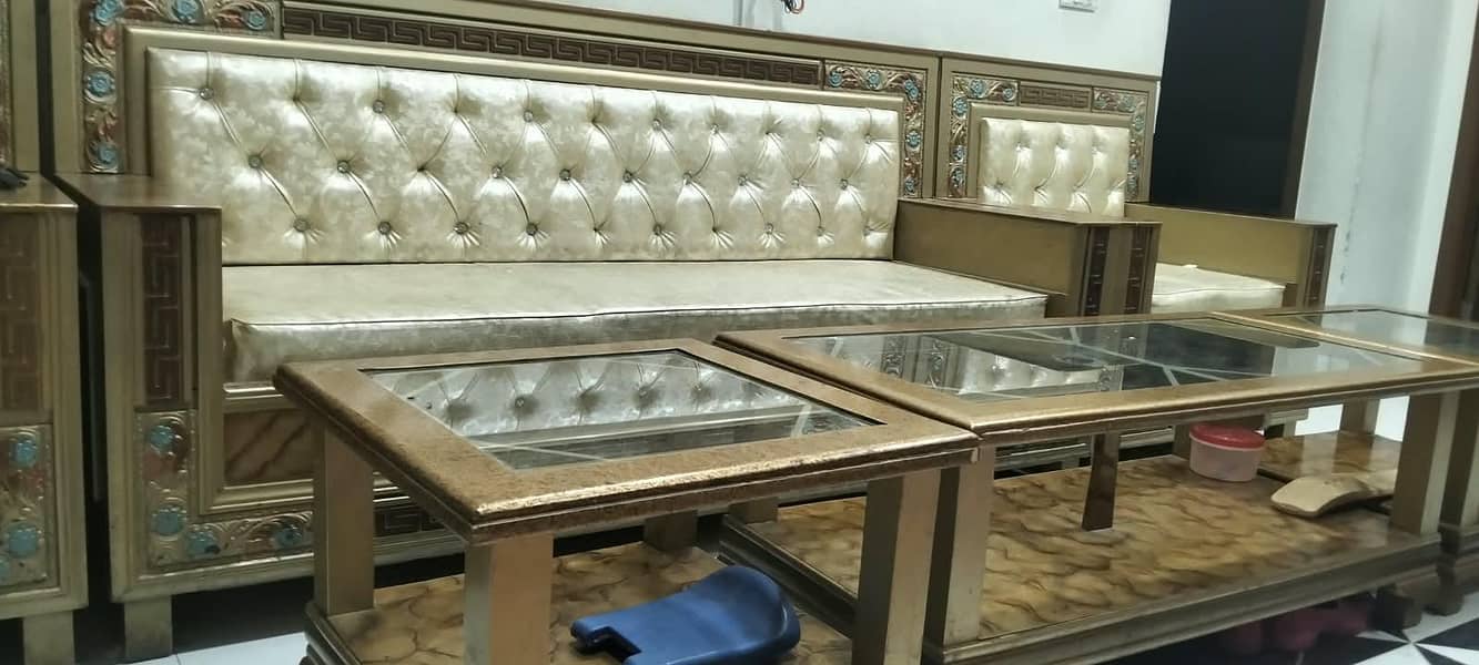 Six setter sofa set with 2 small tables and one large table. 6