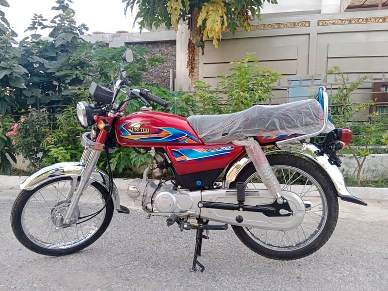 united 70cc 4