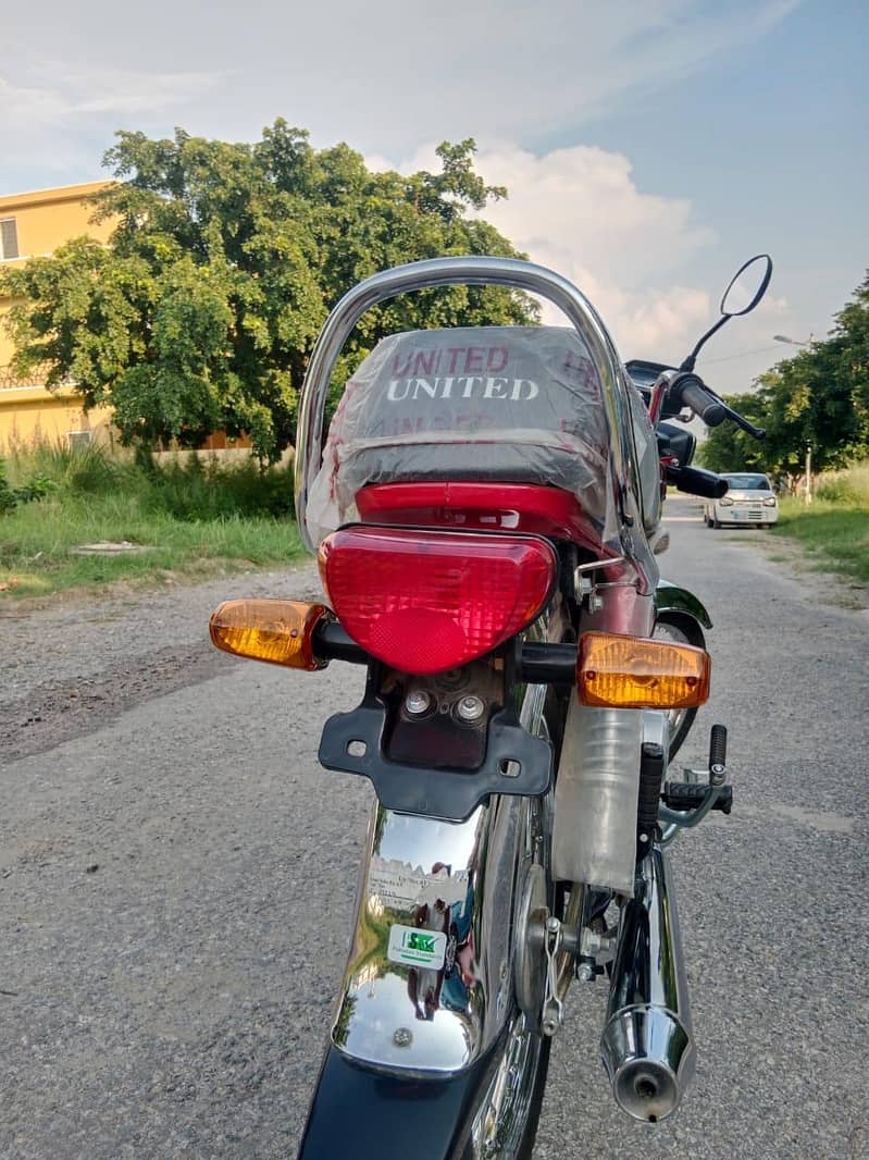 united 70cc 9