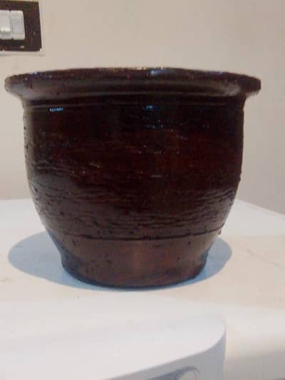 the esthetic brown shiny pot
