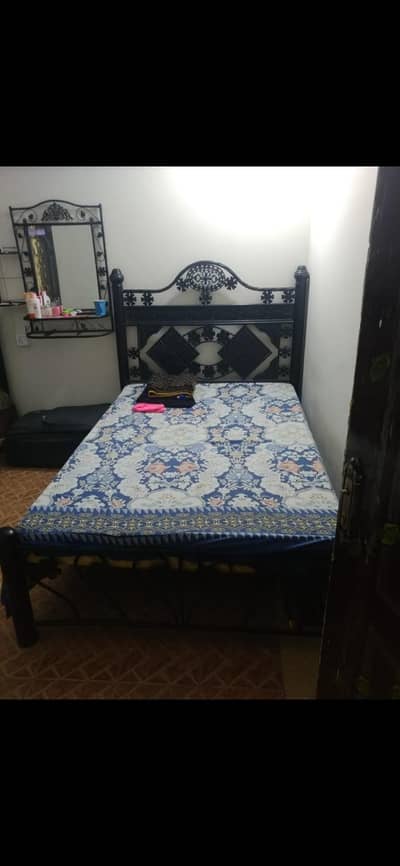 iron 2 bed with mattress 10 by 10