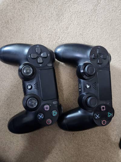 PS4 Slim 1TB with 2 Original Controllers – Good Condition