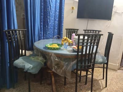 urgent sale dining table & six chairs