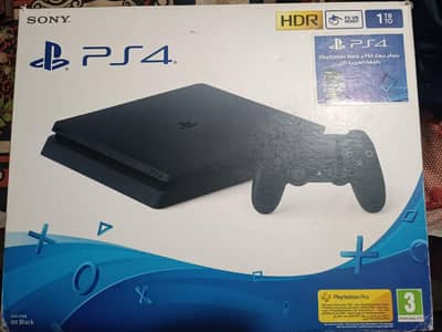 PS4 Slim 1TB with box plus 2 controllers and 1 CD