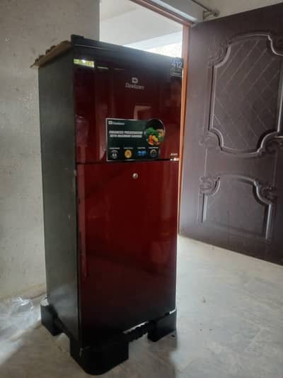 Dawlance small size new fridge not used for single time.