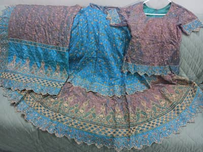 only one time used excellent condition.    heavily embellished